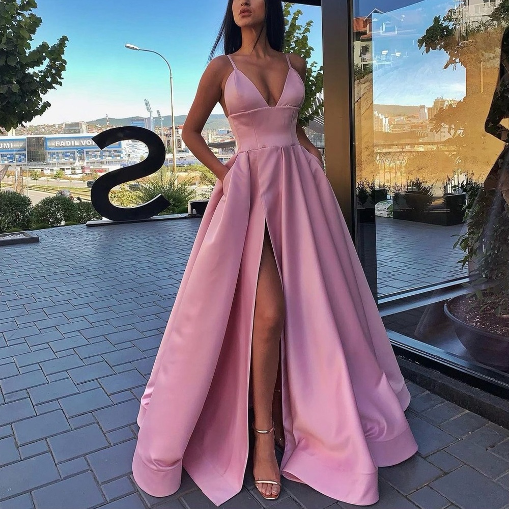 Prom dress like new. Pink satin one of a kind dress that feels like a princess